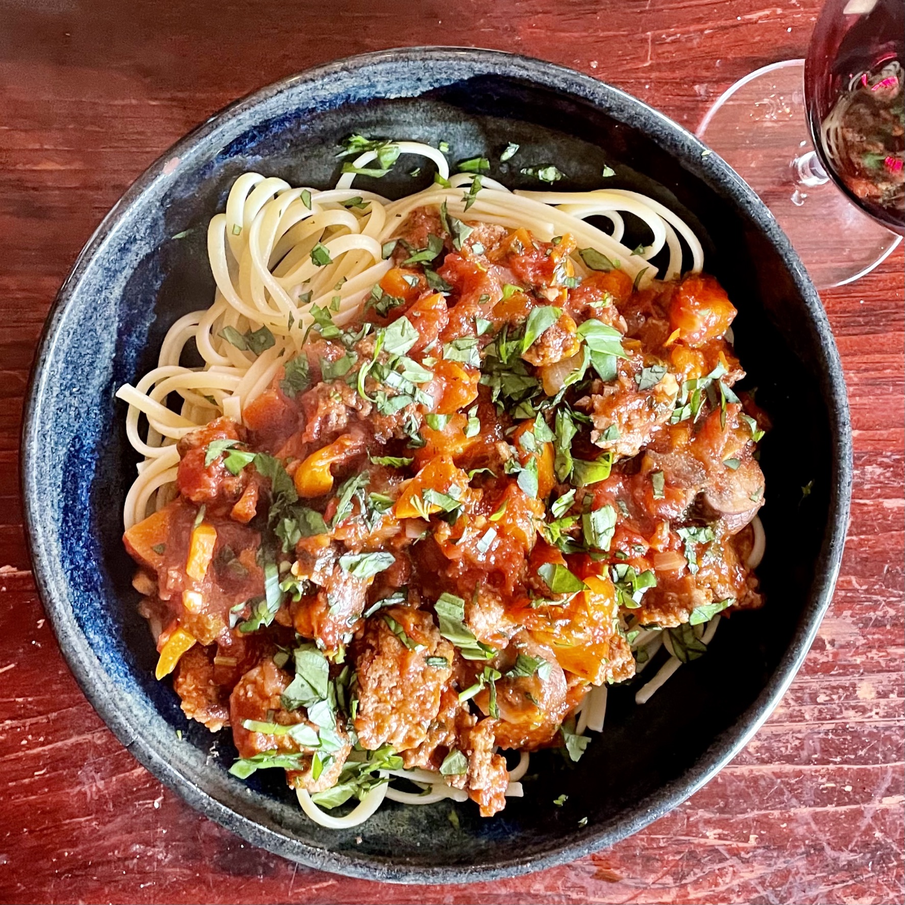 Pasta with tomato sauce with a few extra veggies.